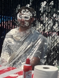 Teacher getting pied in face